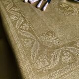 Old linen tablecloth and evening tinted in vermeil