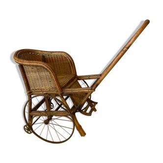 Former rattan stroller