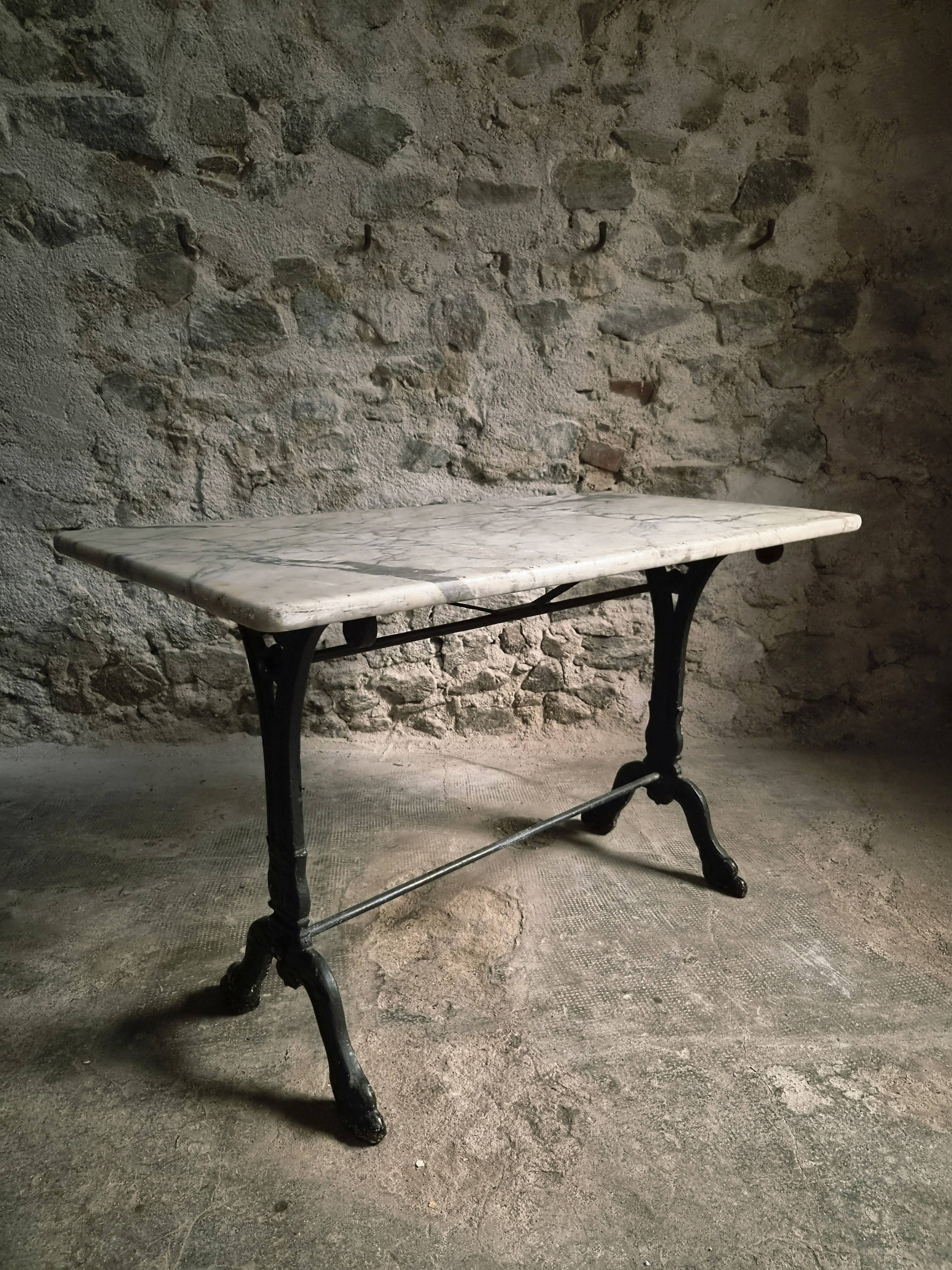 French bistro table made of marble with a cast iron base, 1920s–1930s.