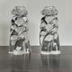 Pair of signed Baccarat Aladin candlesticks