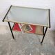 Vintage 1950s rolling dessert trolley with two shelves.