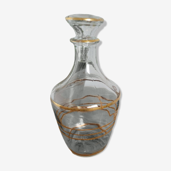 Small glass bottle with gold edges