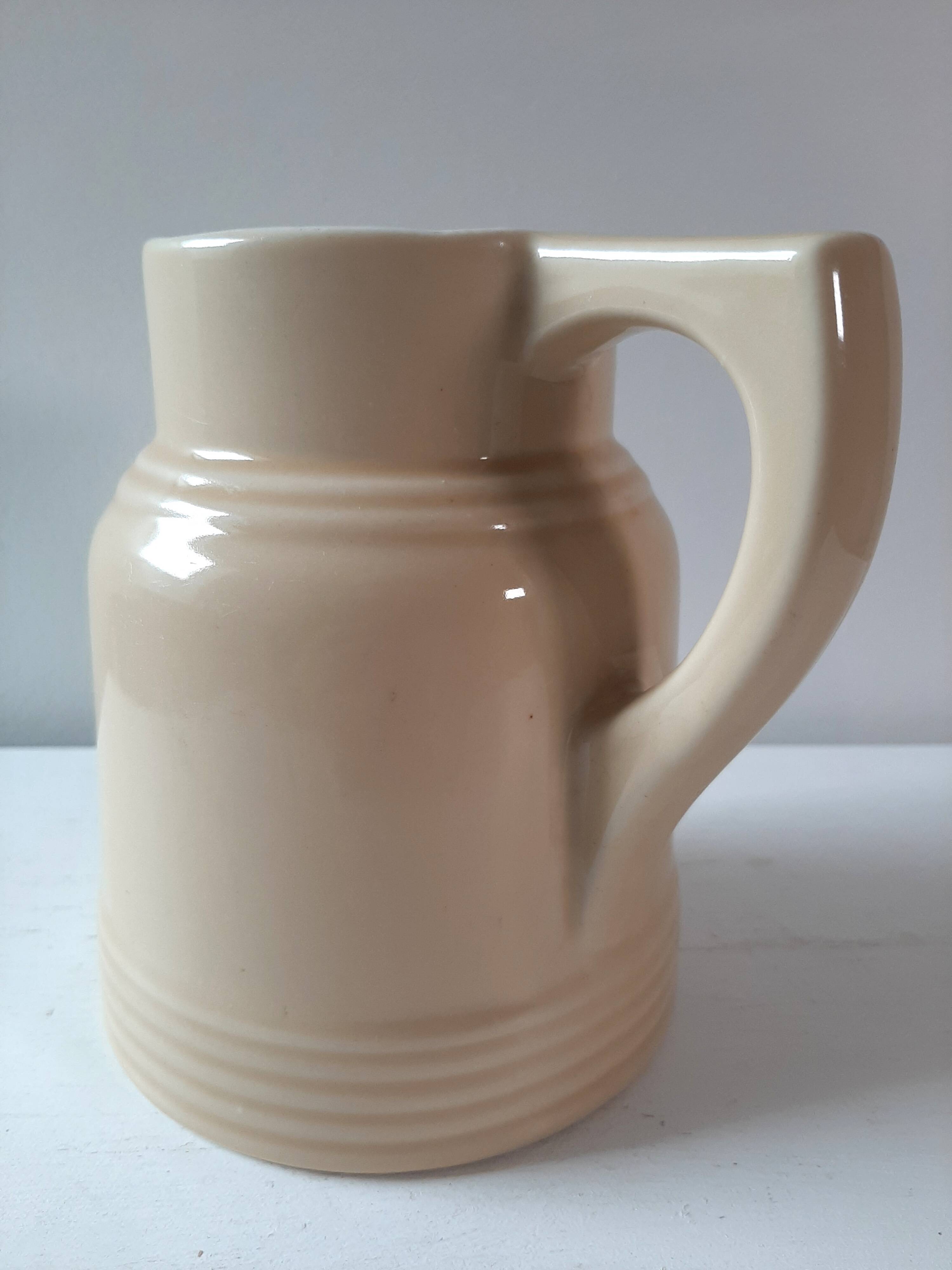 Pitcher in cream color