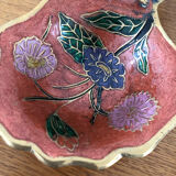 Empty pockets in brass and floral decoration