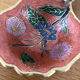 Empty pockets in brass and floral decoration