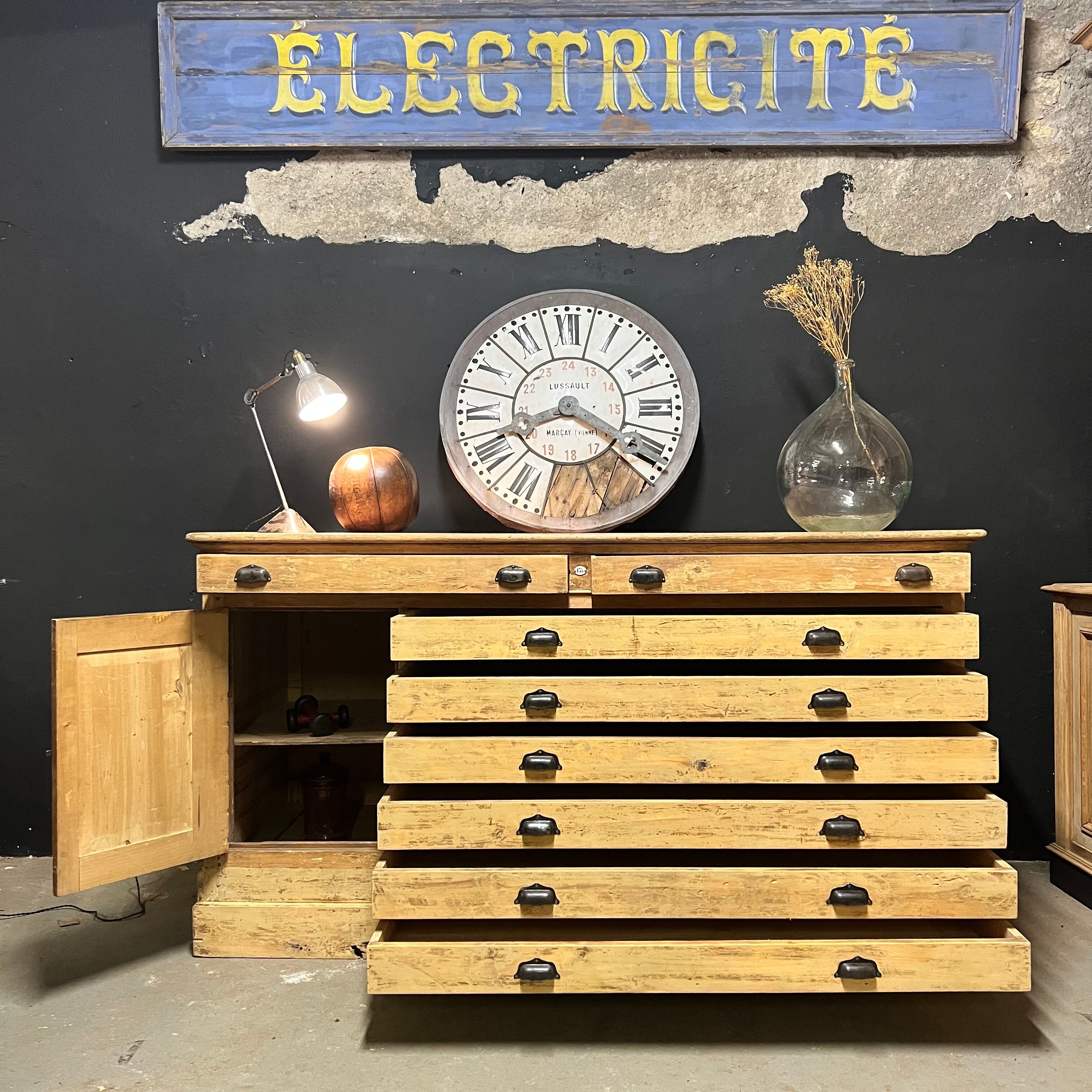 Old piece of furniture by trade with an architect's plan