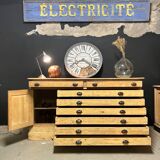 Old piece of furniture by trade with an architect's plan