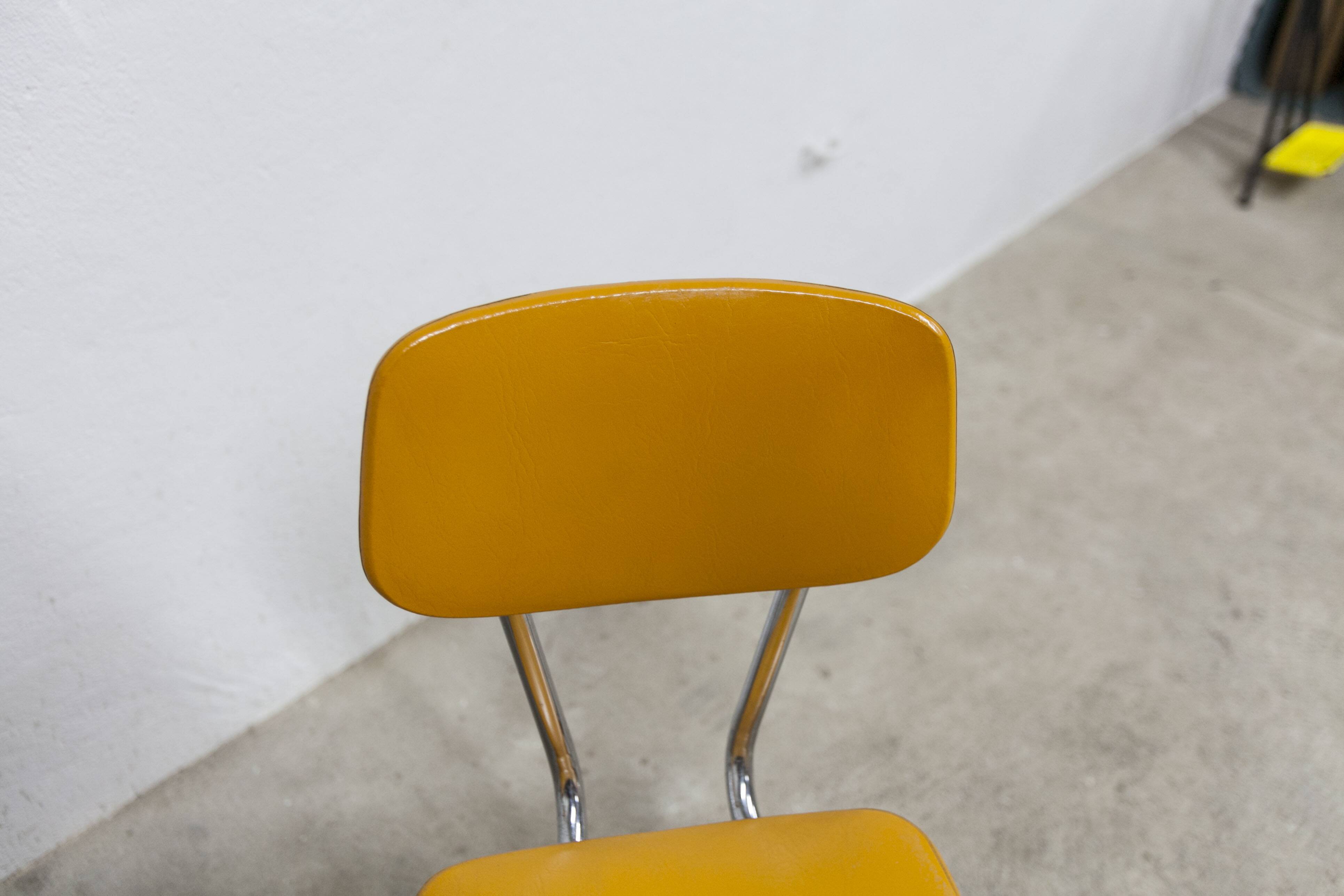 Pair of mustard-colored 70s welded Skai chairs