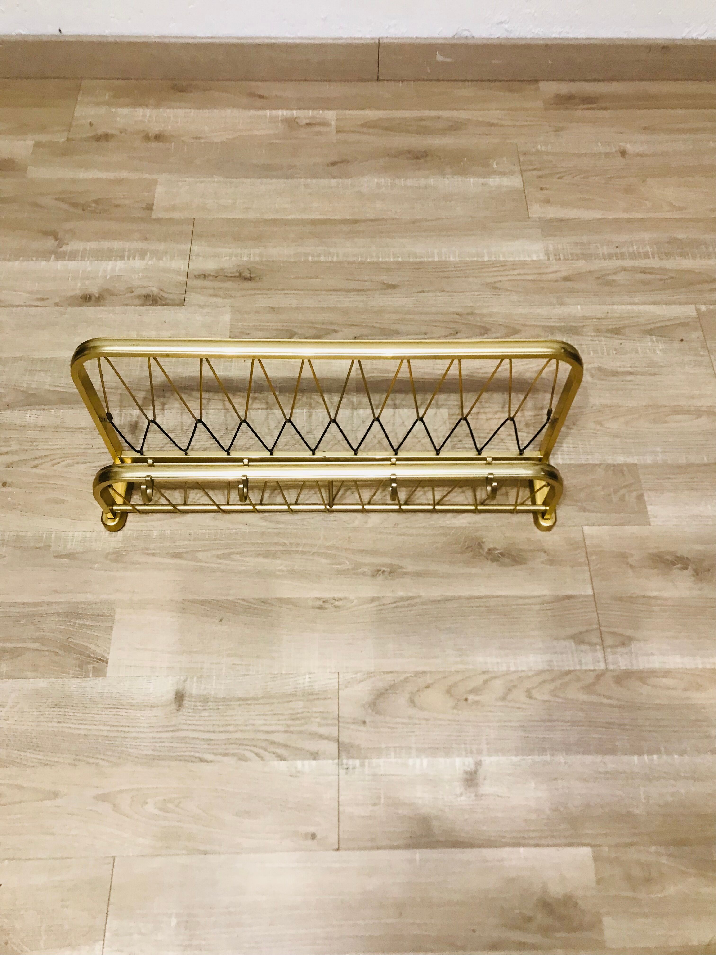 Wall-mounted cloakroom coat rack