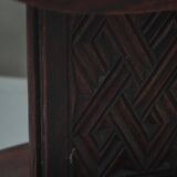 Sculptural African stool in hardwood, curved seat and architectural base, 1970s.