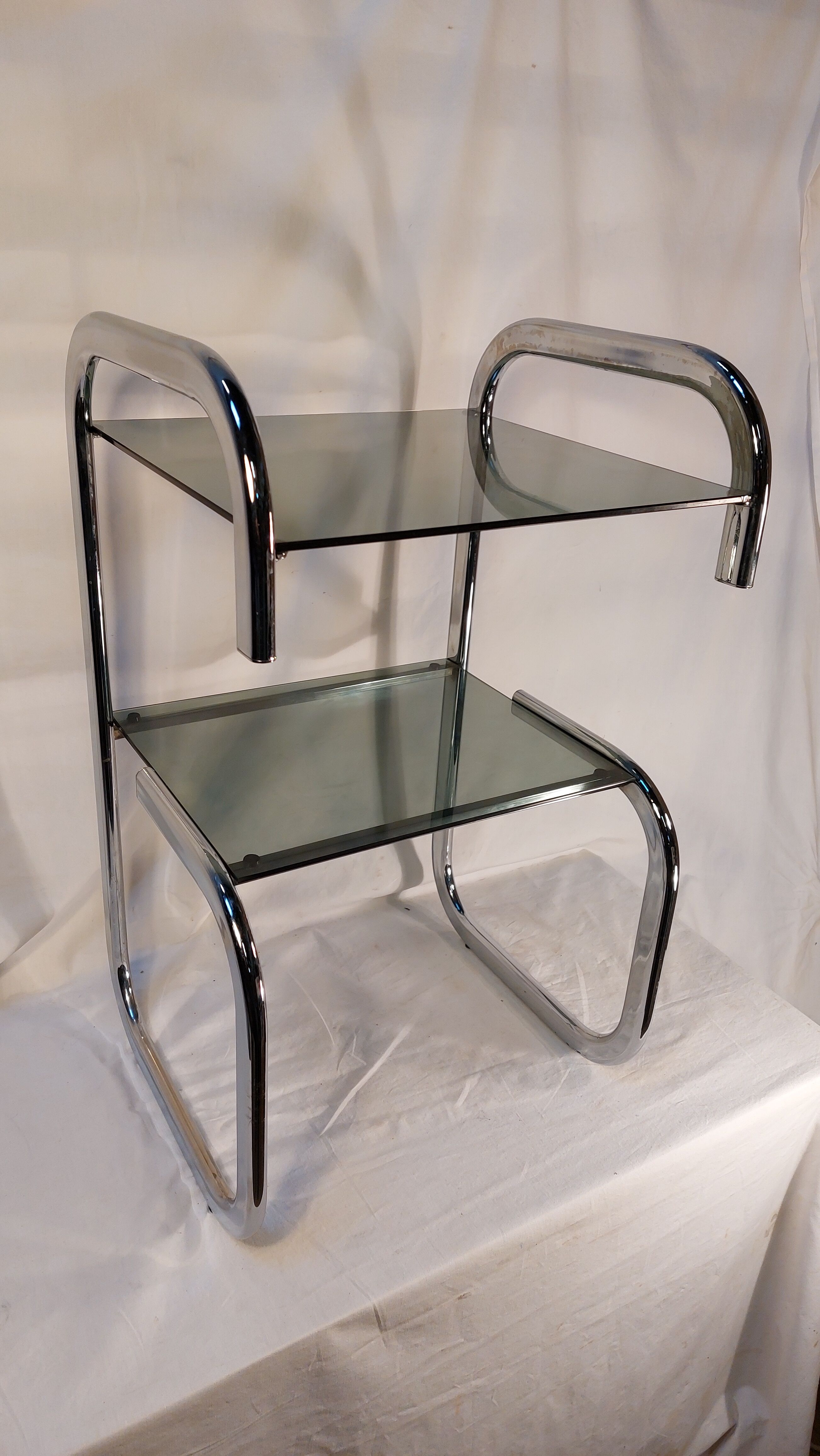 Vintage side table in chrome and smoked glass