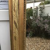 Mirror with a golden leaf pediment, 151x90cm