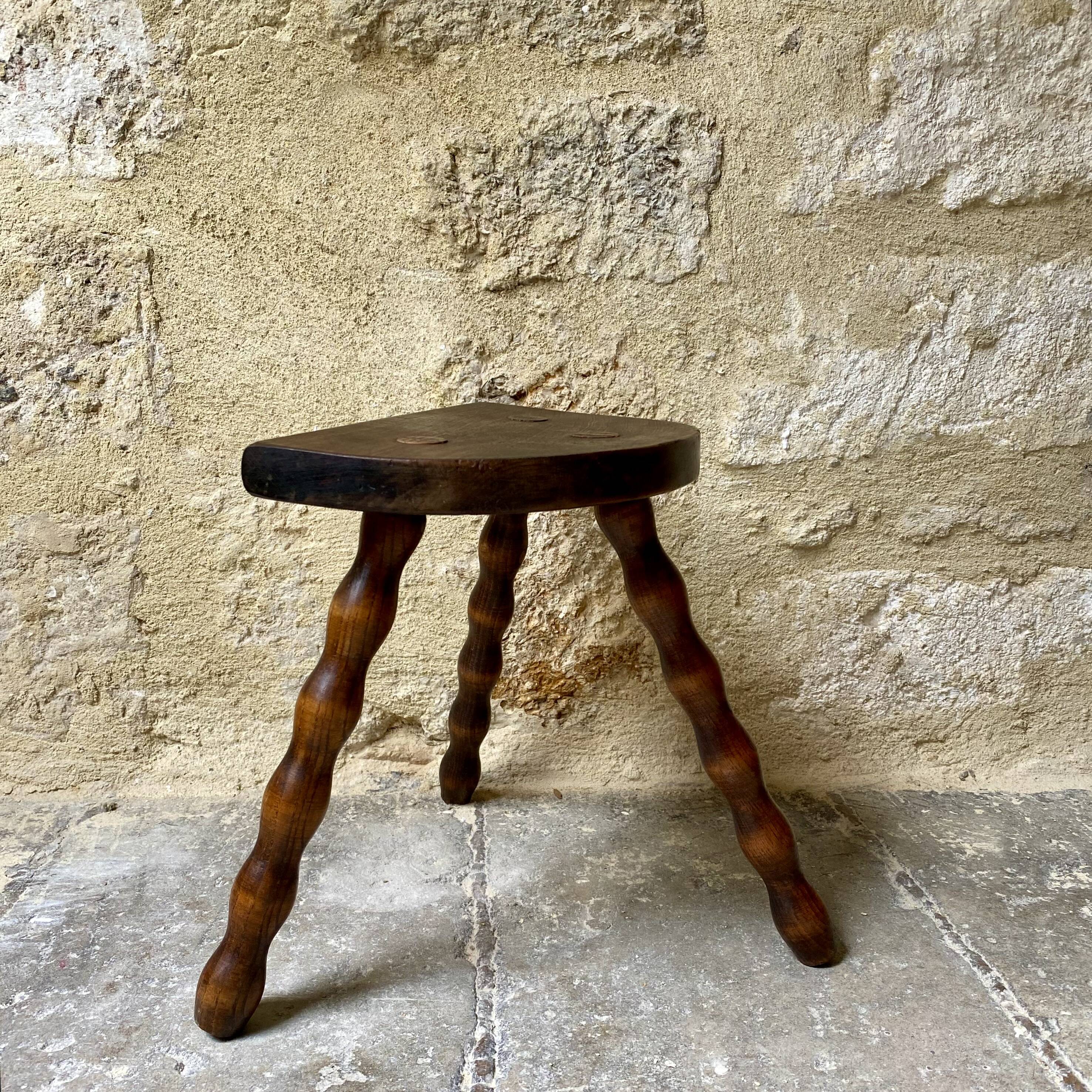 Turned wooden tripod stool