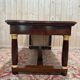 Bureau plat de style Empire en acajou et cuir vert