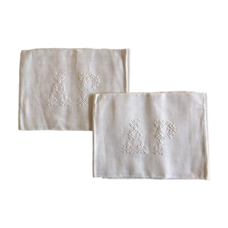pair of AP monogram towels in cold linen