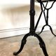 Bistro table in gray marble and cast iron