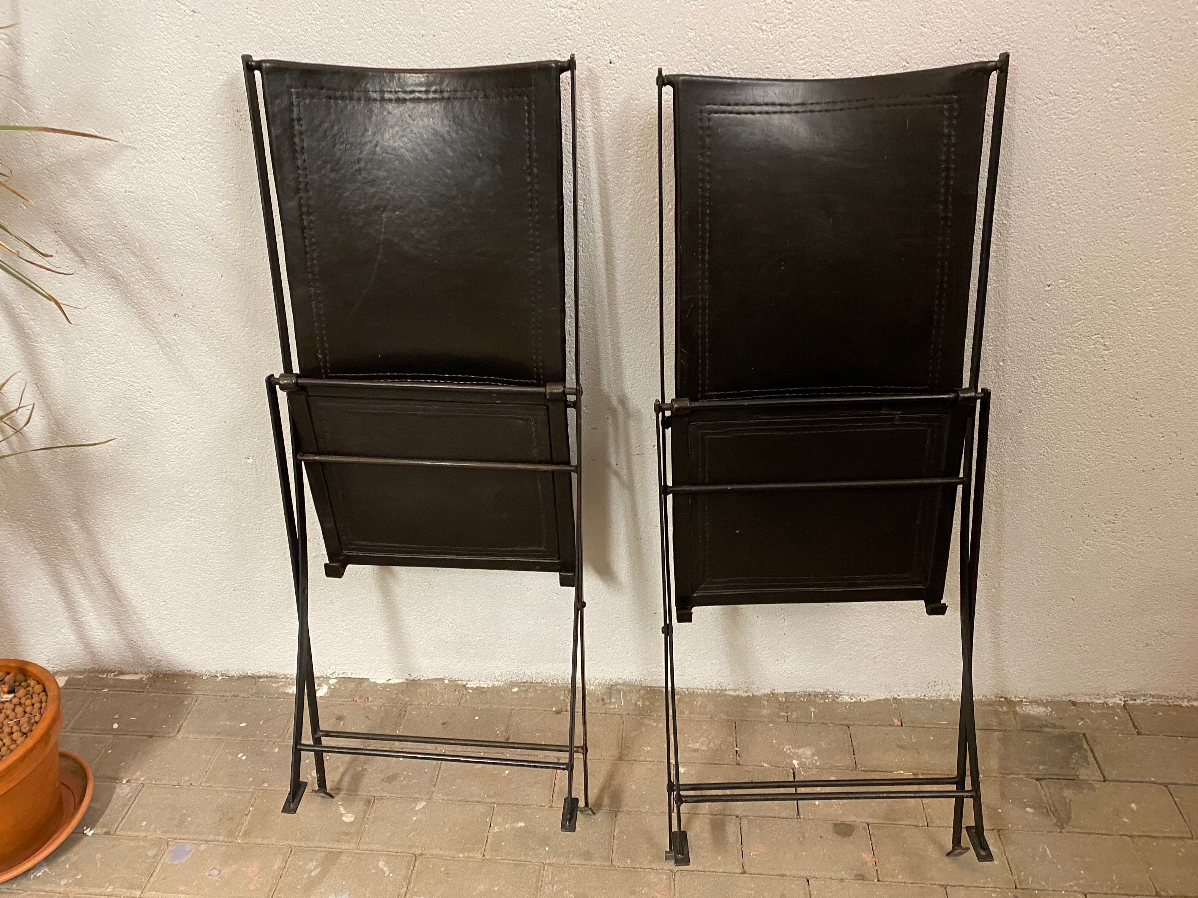 1950s vintage iron folding chairs and leather