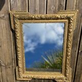 Miroir en bois et stuc doré