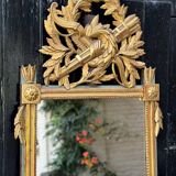 Louis XVI carved and gilded wood mirror, late 18th century