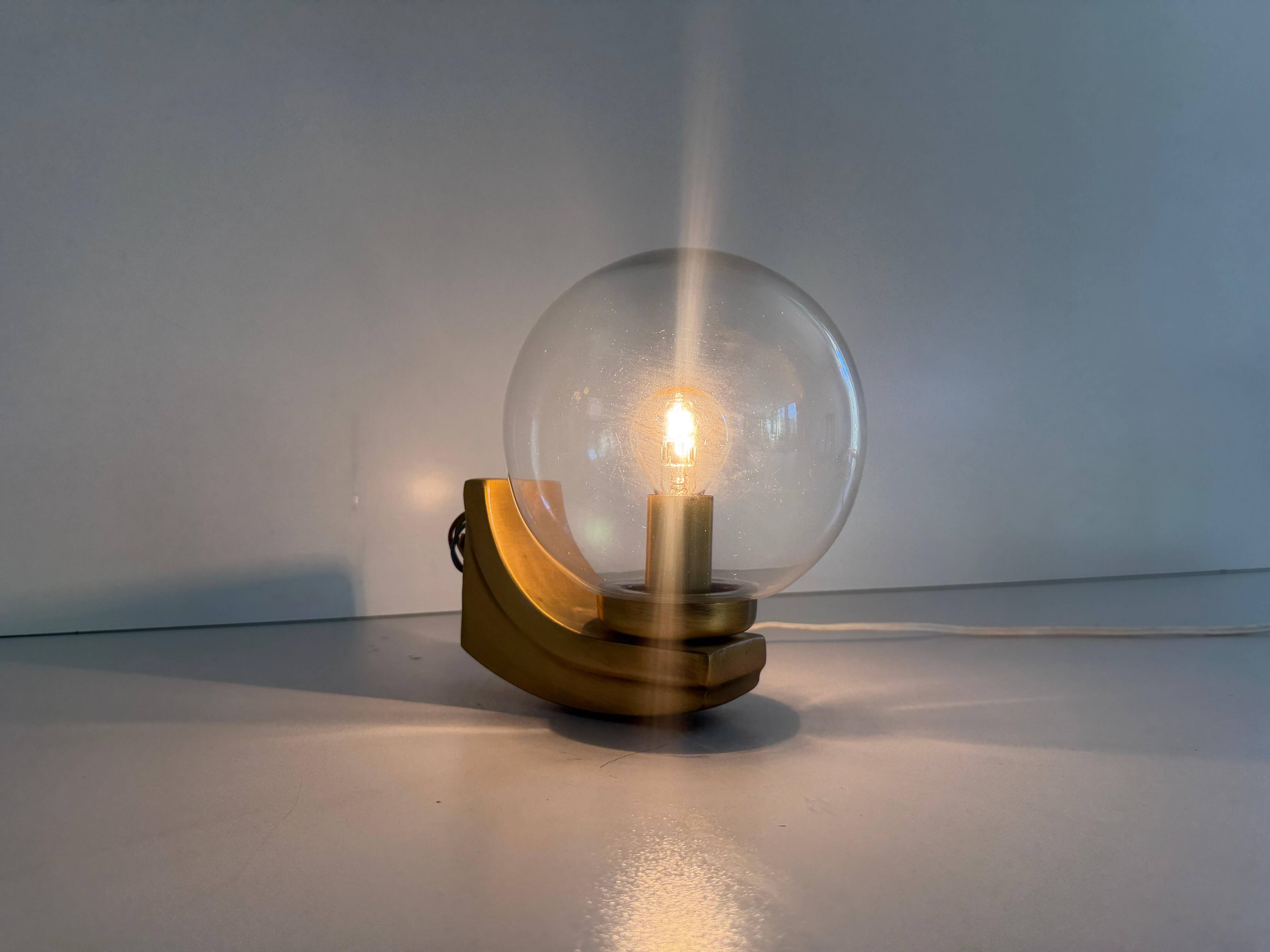 Simple glass and brass wall light from the mid-century, 1960, Germany.