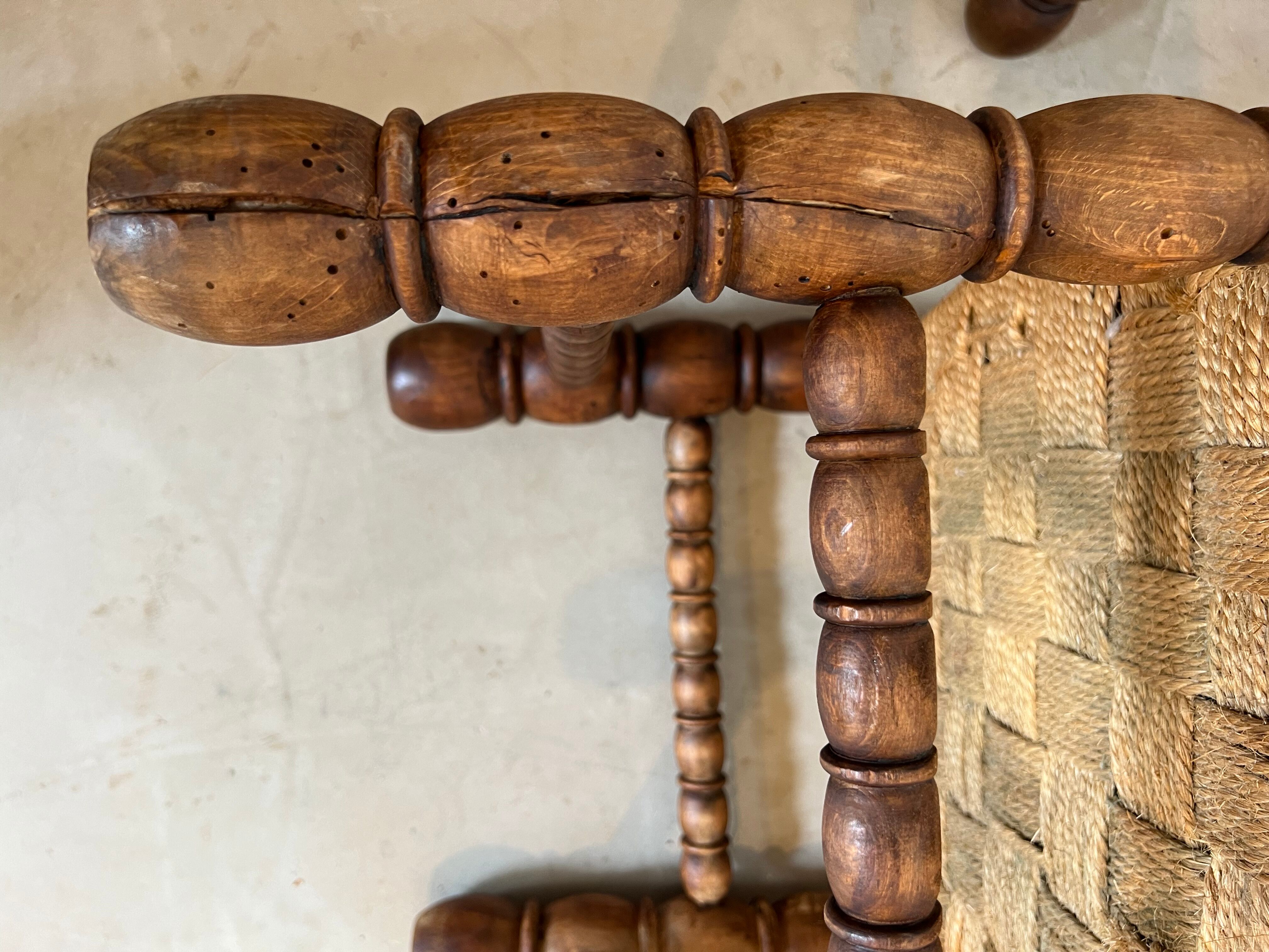 Pair of low chairs in turned wood