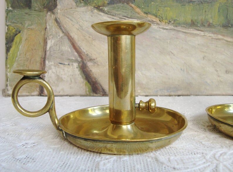 Pair of old brass candlesticks