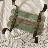 Low stool with wooden and metal slats