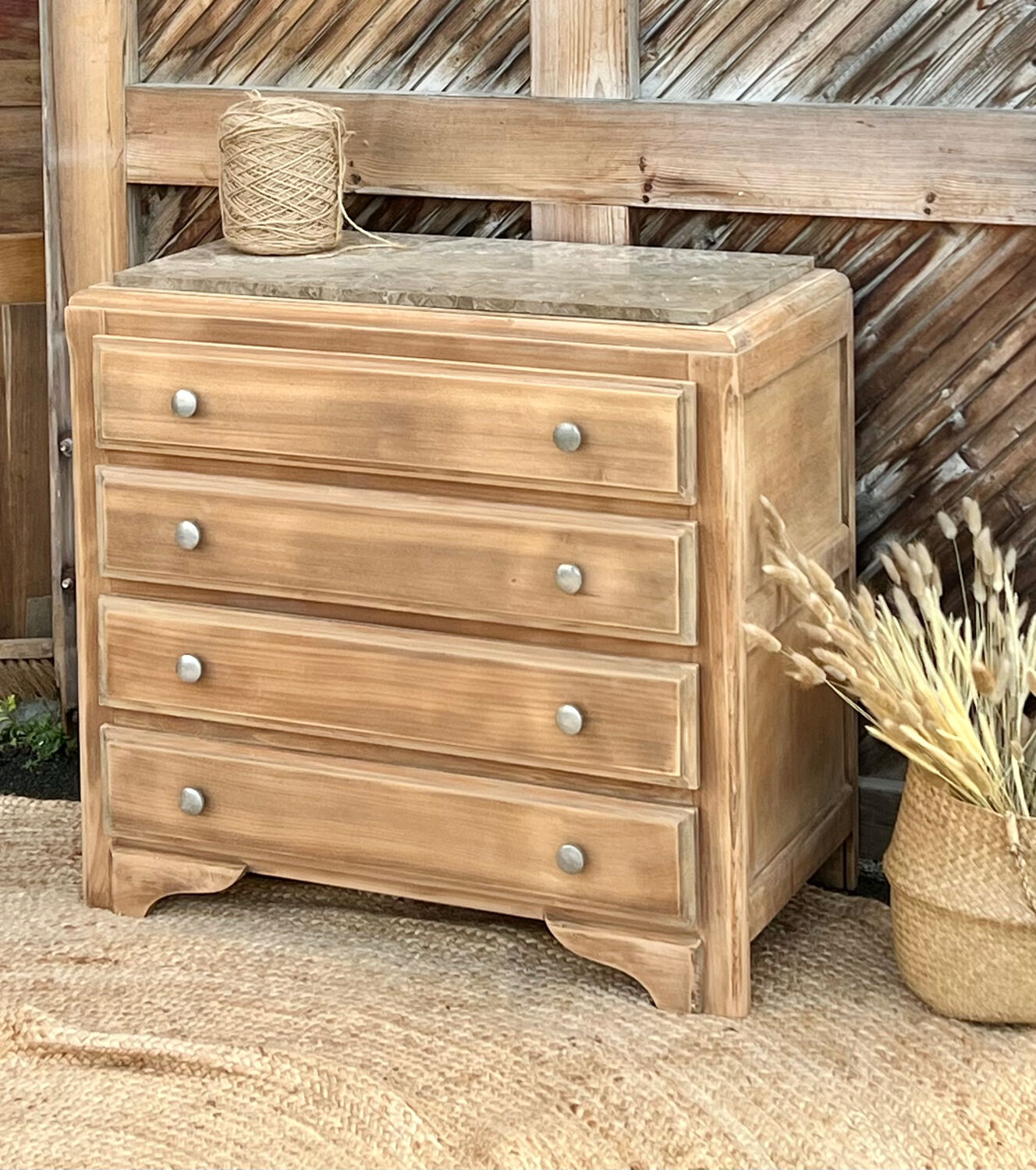 Antique wooden commode with beige marble.