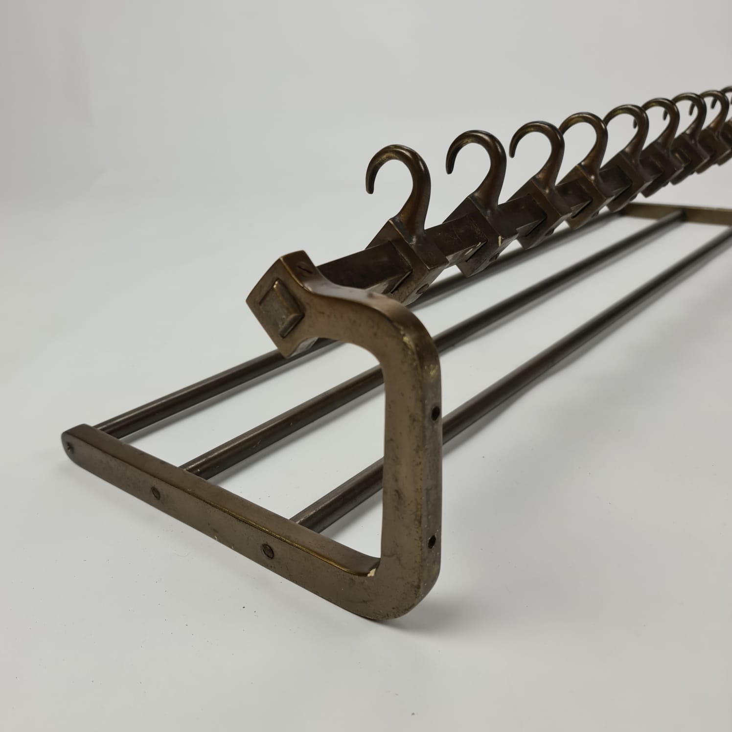 Mid century old industrial wall mounted coatrack