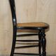 Four antique Regency bergère chairs with mother-of-pearl inlay.