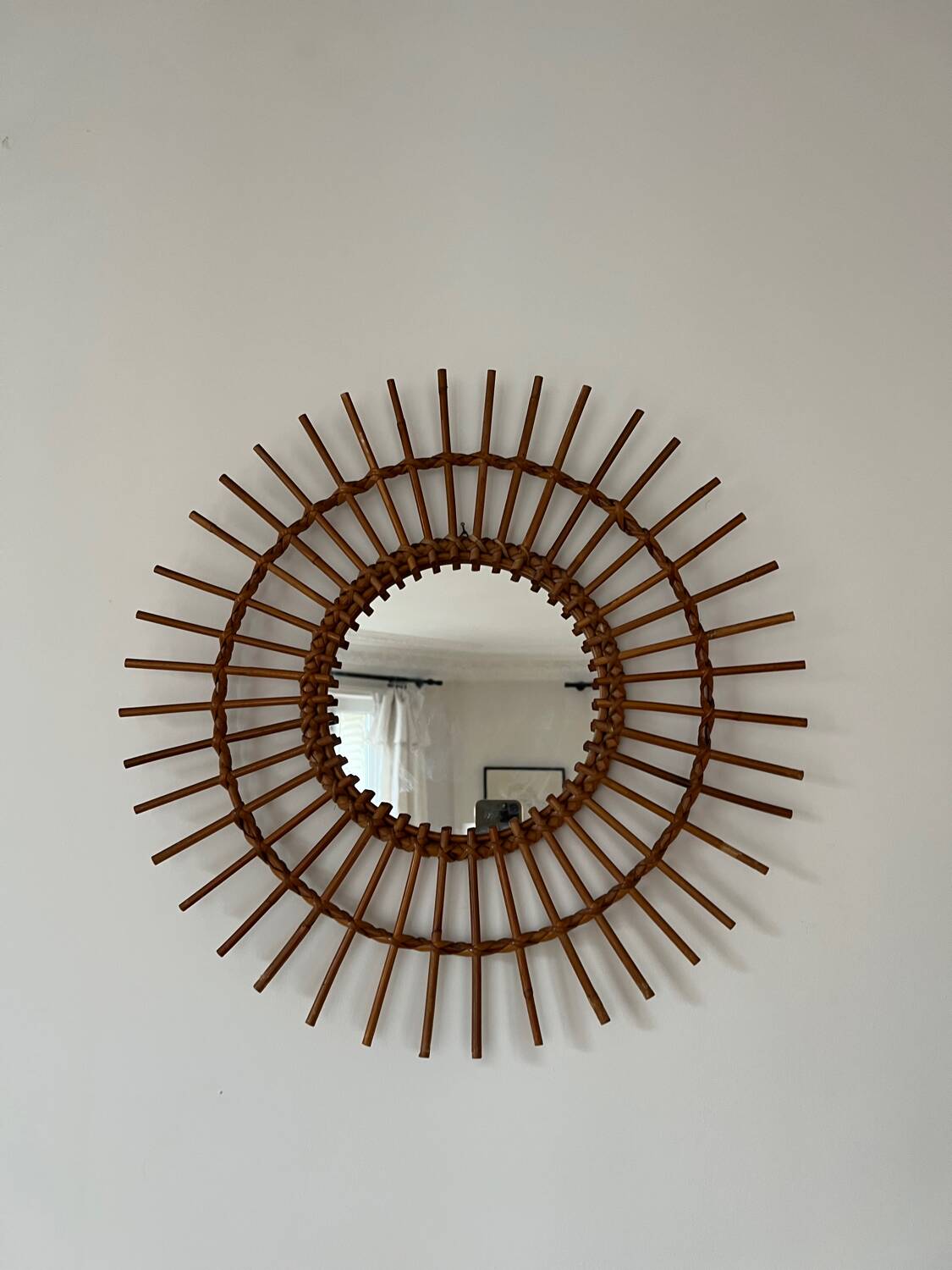 Large vintage rattan sun mirror