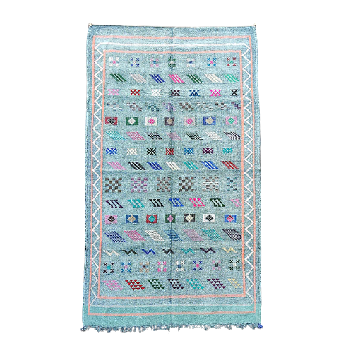 Faded blue Berber ethnic carpet