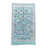 Faded blue Berber ethnic carpet