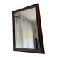 Vintage bevelled wall mirror in stained wood and brass
