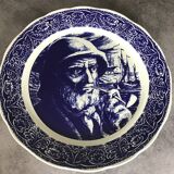 Blue enamelled earthenware wall plate with fisherman decor, Boch La Louvière, Belgium