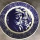 Blue enamelled earthenware wall plate with fisherman decor, Boch La Louvière, Belgium