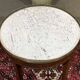 Louis XVI style bouillotte table in mahogany with a white marble top.