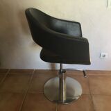 Professional vintage chair sitting in leather and chrome feet adjustable