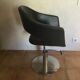 Professional vintage chair sitting in leather and chrome feet adjustable