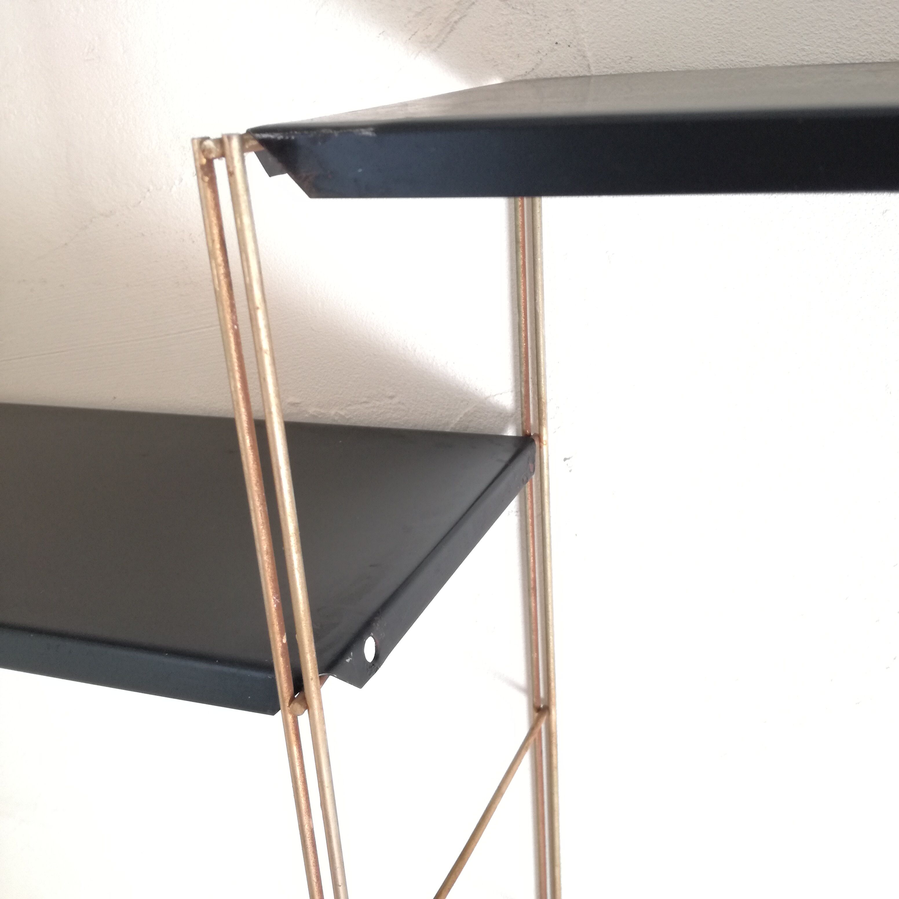 Gold and black String shelf