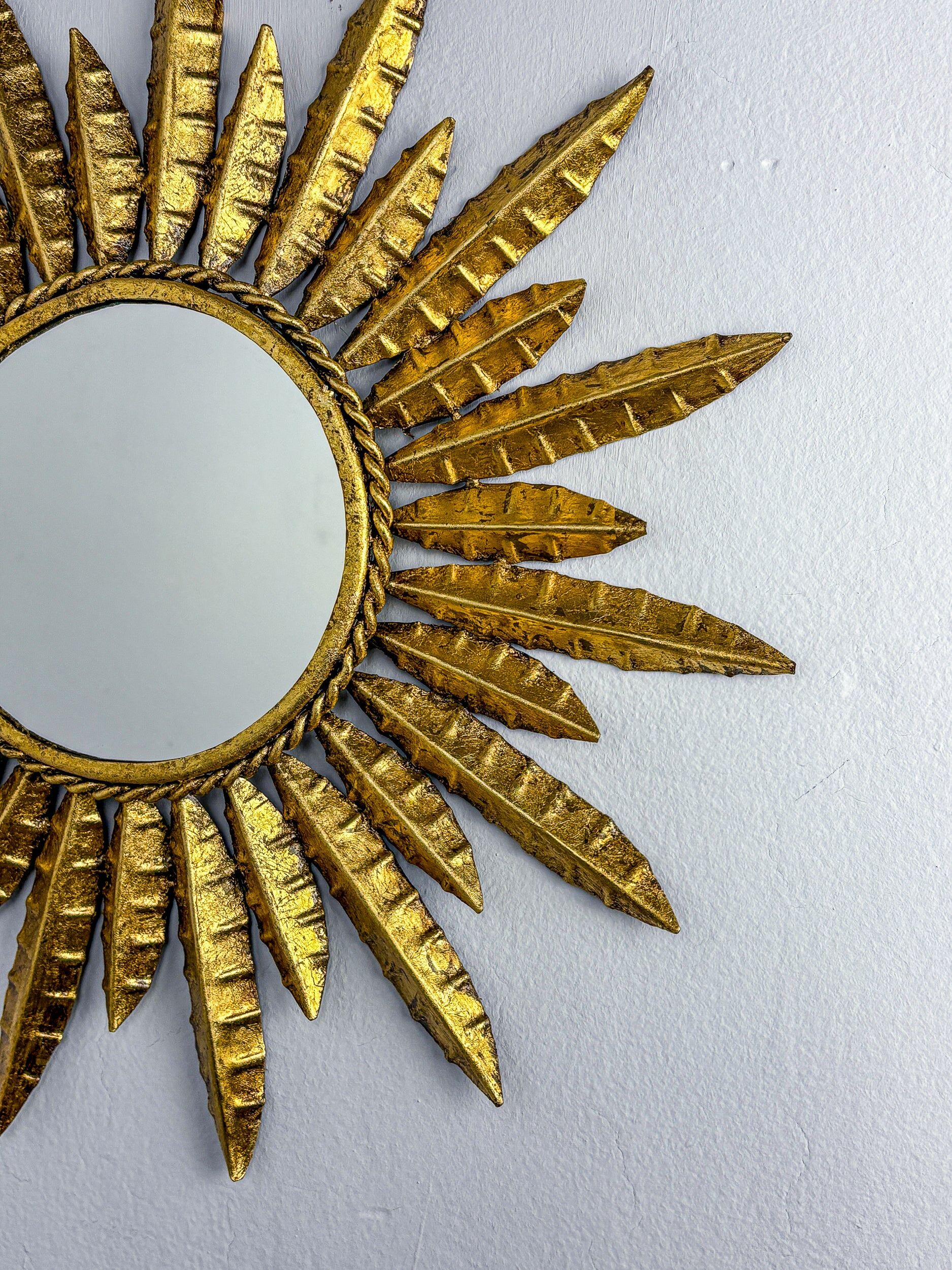 Midcentury modern sunburst wall mirror – gilt metal, France 1960s