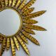 Midcentury modern sunburst wall mirror – gilt metal, France 1960s