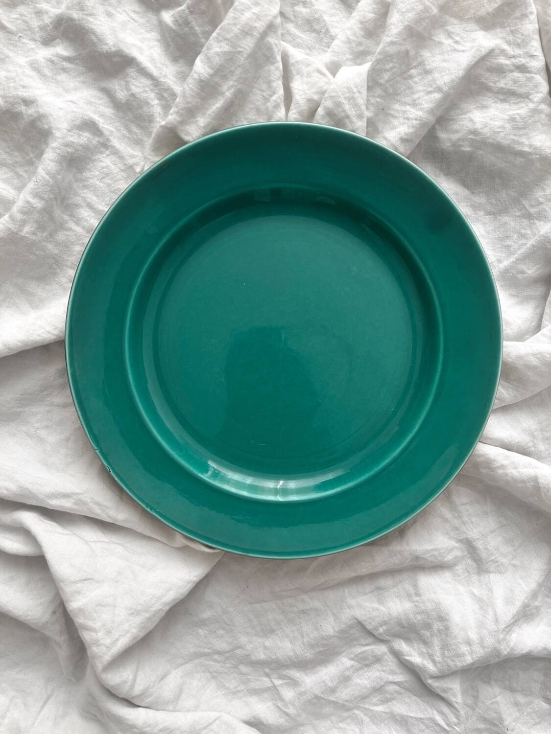 Vintage green round earthenware dish