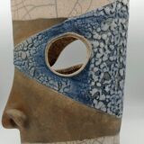 Pair of ceramic face vases