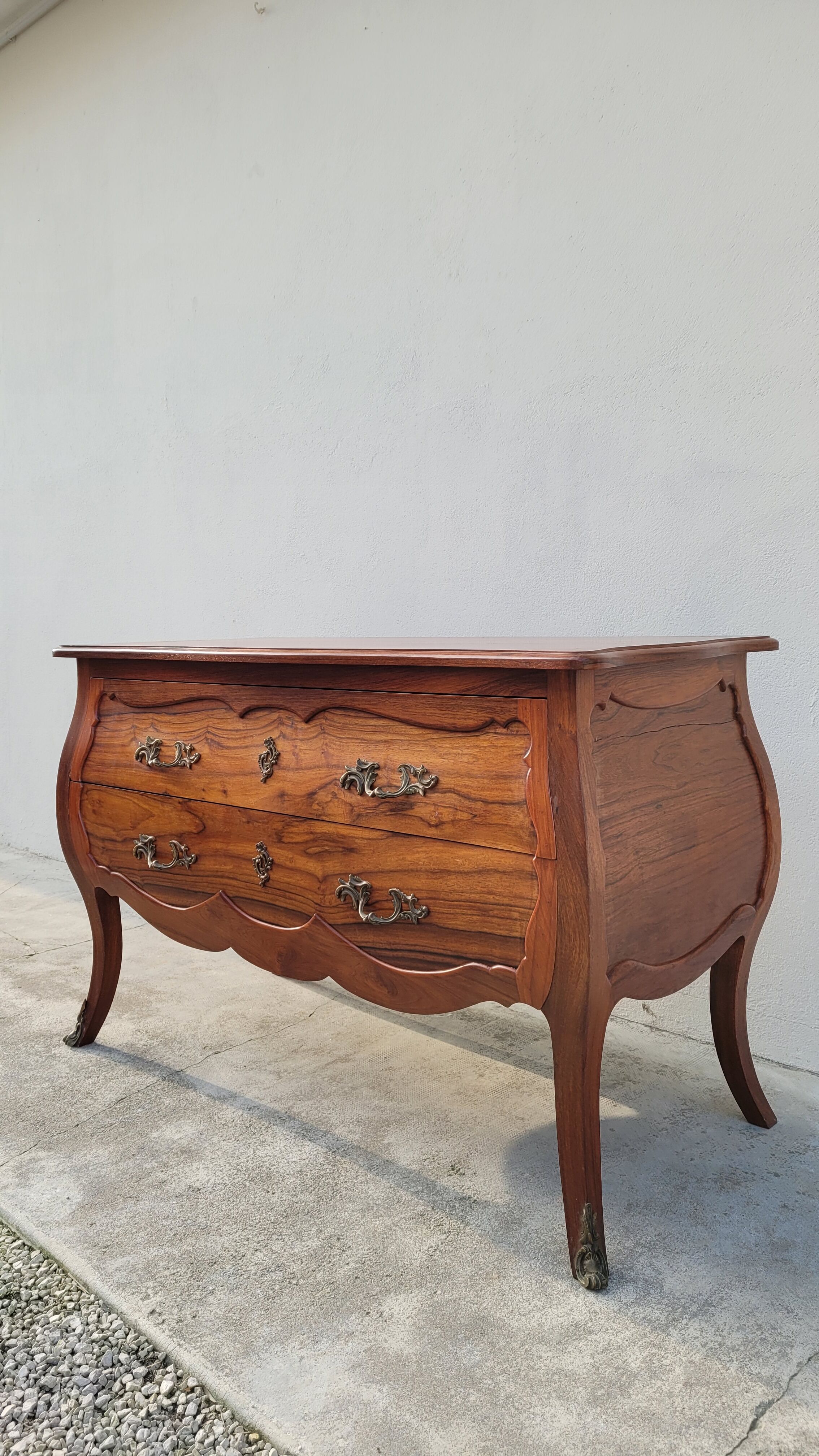 Curved Louis XV style commode in mahogany.
