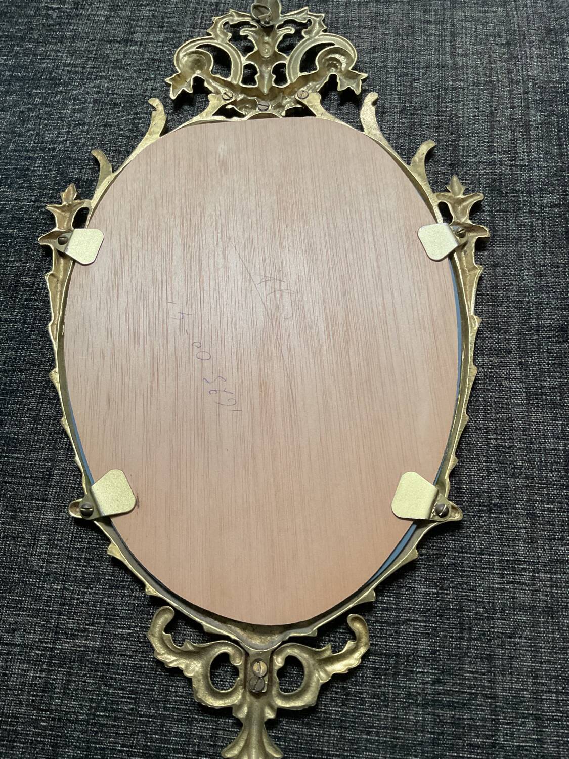 Louis XV style mirror in brass