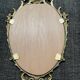 Louis XV style mirror in brass