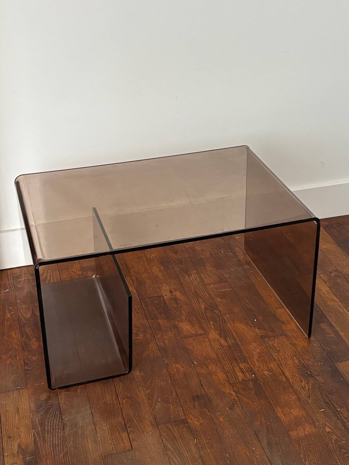 Smoked plexiglass coffee table