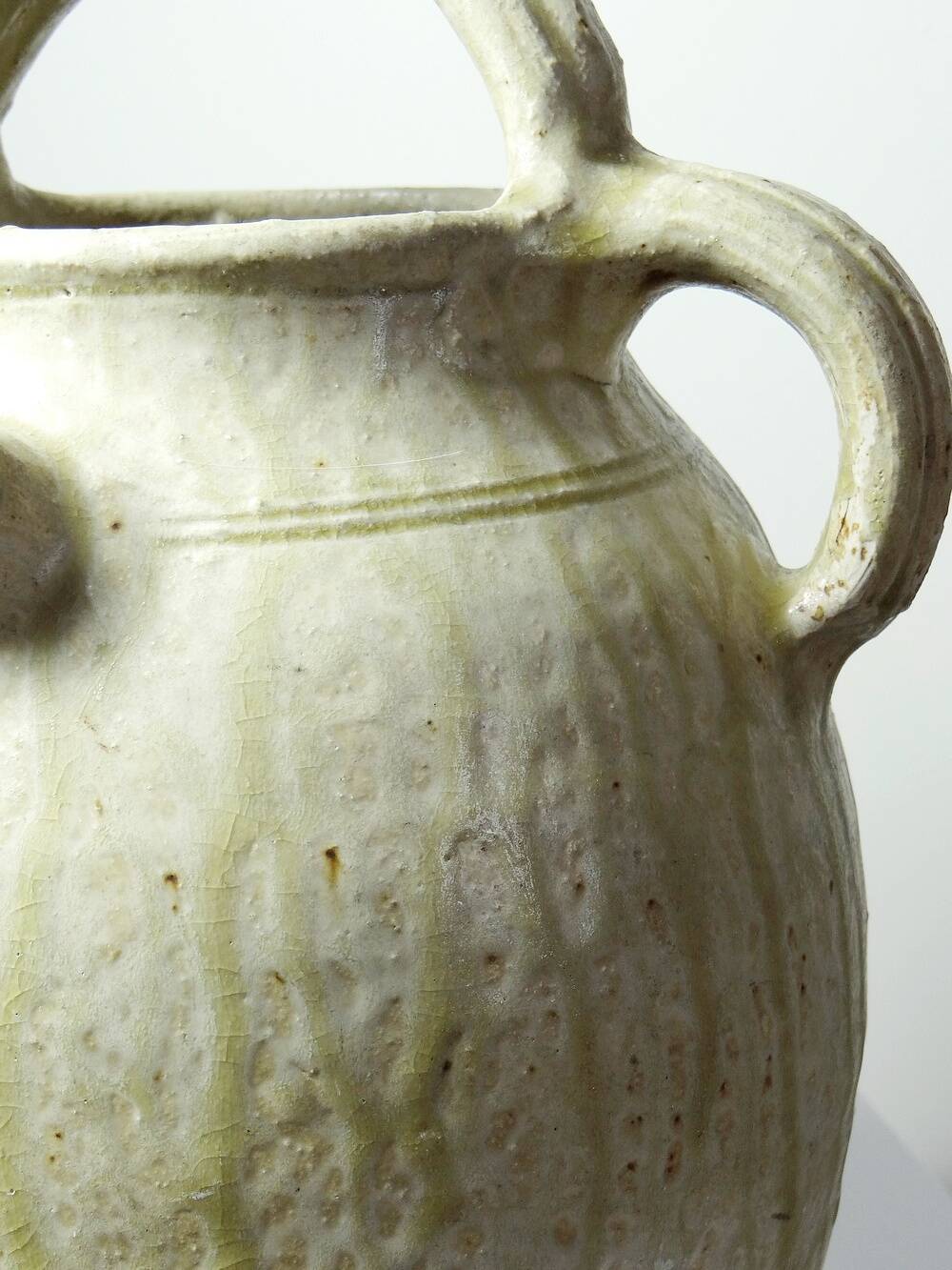 Green ash-glazed stoneware casserole from Puisaye, late 19th to early 20th century.
