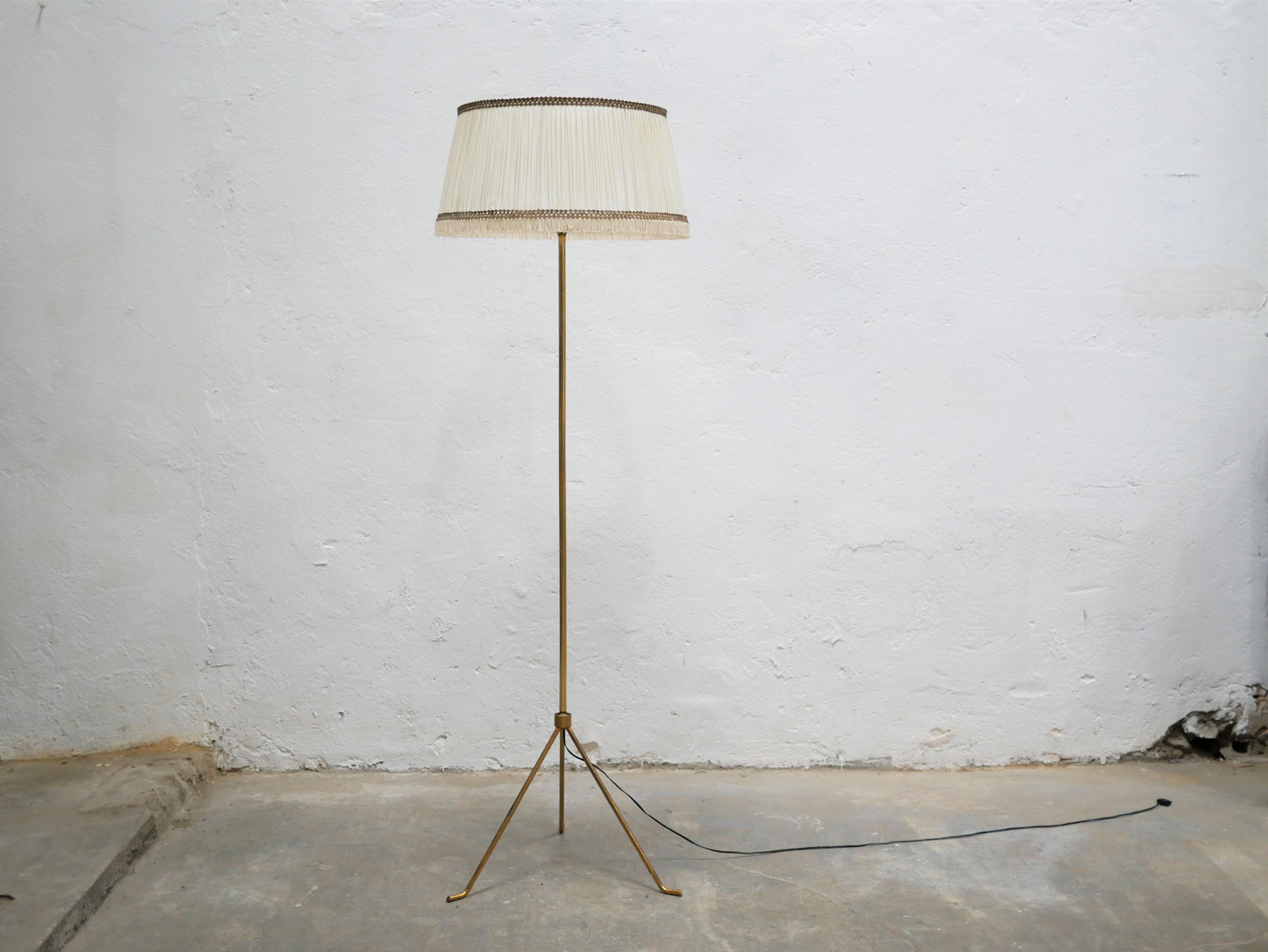 Vintage brass tripod floor lamp